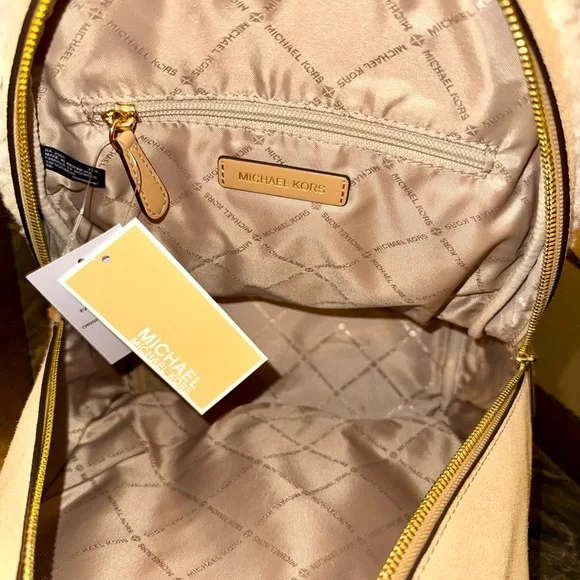 Michael Kors Beige Backpack with Shearling Accents display picture 1